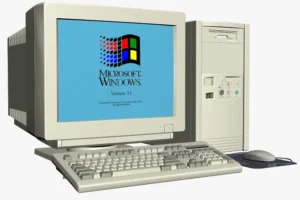 Computadora antigua con Windows 3.1, representando la era de la piratería tecnológica en los años 80 y 90.