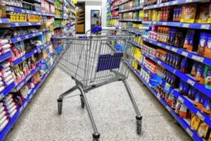 Comercios minoristas pyme con clientes durante diciembre, reflejando caída de ventas y expectativas para 2026.